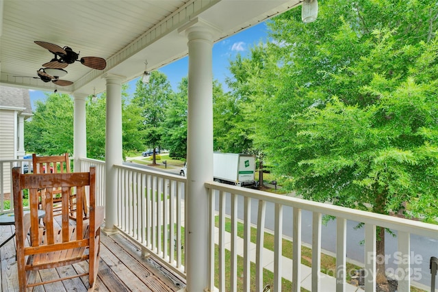 1636 Ridge Haven Rd, Waxhaw, NC 28173 - porch with a ceiling fan and view of scattered trees