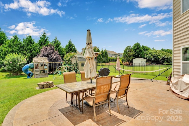 1636 Ridge Haven Rd, Waxhaw, NC 28173 - view of patio with a playground, an outdoor fire pit, and outdoor dining area