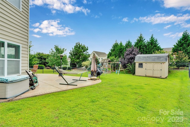 1636 Ridge Haven Rd, Waxhaw, NC 28173 - view of yard with a playground, a patio, and a storage shed