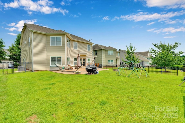 1636 Ridge Haven Rd, Waxhaw, NC 28173 - back of property featuring a fenced backyard, a patio, and a playground