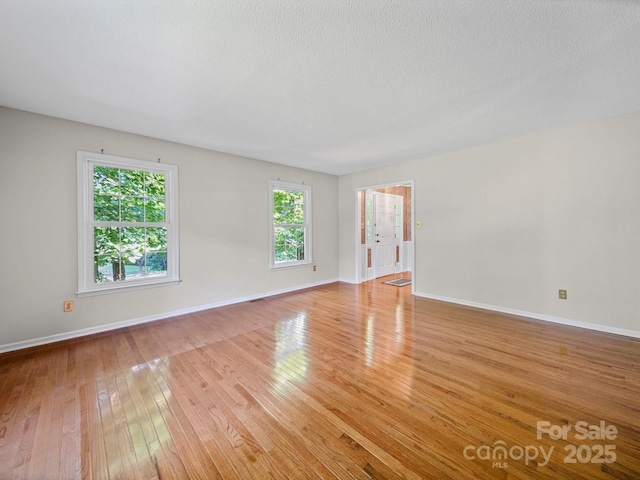 2020 Dawnshire Dr, Gastonia, NC 28054 - spare room with light wood-type flooring and baseboards