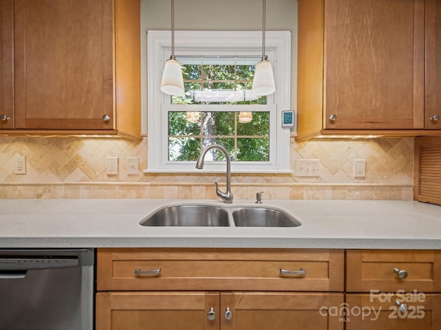 2020 Dawnshire Dr, Gastonia, NC 28054 - kitchen with stainless steel dishwasher, decorative backsplash, decorative light fixtures, and brown cabinets