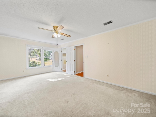 2020 Dawnshire Dr, Gastonia, NC 28054 - unfurnished room featuring ornamental molding, carpet flooring, ceiling fan, and a textured ceiling