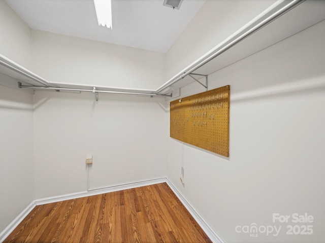 2020 Dawnshire Dr, Gastonia, NC 28054 - walk in closet featuring wood finished floors