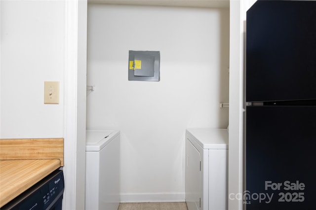 1604 Sharon Rd W Unit 30, Charlotte, NC 28210 - laundry room featuring washing machine and dryer and baseboards