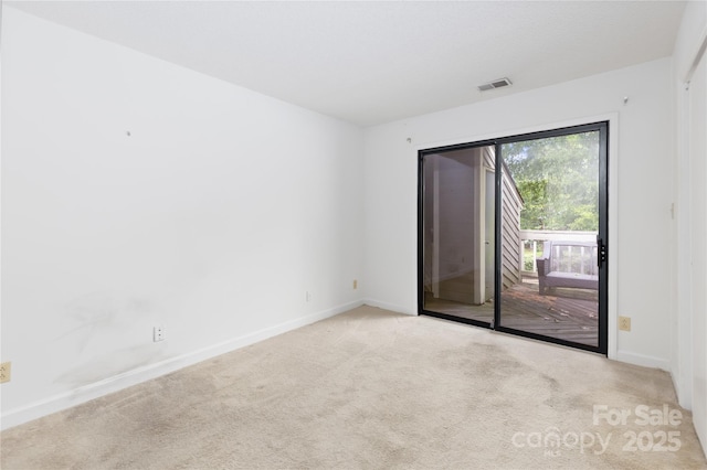 1604 Sharon Rd W Unit 30, Charlotte, NC 28210 - spare room with baseboards and carpet