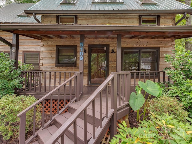 5109 Walnut Grove Ln, Charlotte, NC 28227 - entrance to property featuring a metal roof and a porch
