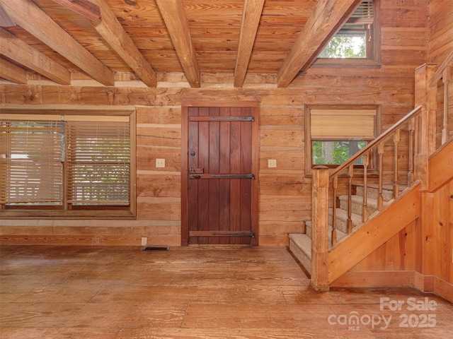 5109 Walnut Grove Ln, Charlotte, NC 28227 - foyer entrance with wooden walls, a wood ceiling with exposed beams, hardwood / wood-style flooring, and stairway