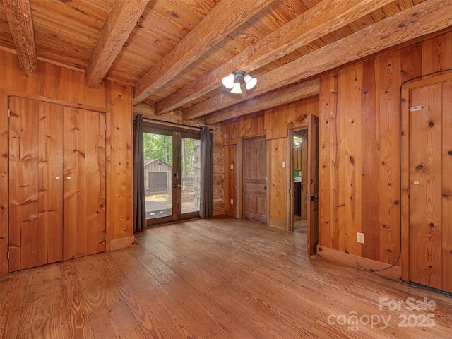 5109 Walnut Grove Ln, Charlotte, NC 28227 - spare room featuring wooden walls, hardwood / wood-style floors, and a wood ceiling with exposed beams