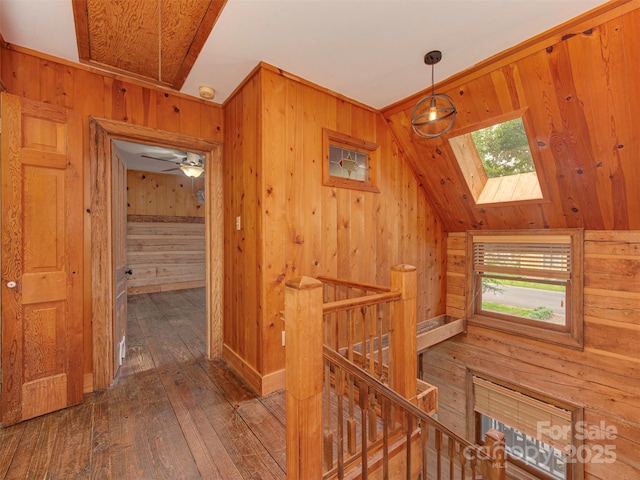 5109 Walnut Grove Ln, Charlotte, NC 28227 - corridor with wood walls, an upstairs landing, wood-type flooring, a skylight, and vaulted ceiling