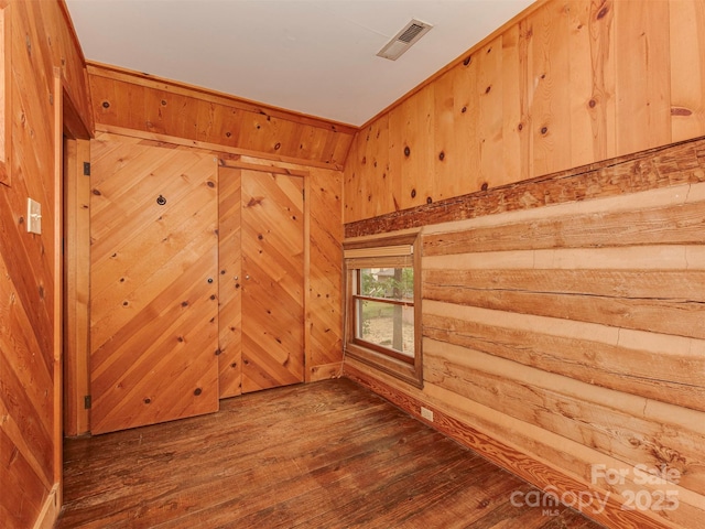 5109 Walnut Grove Ln, Charlotte, NC 28227 - spare room with wood walls and wood finished floors