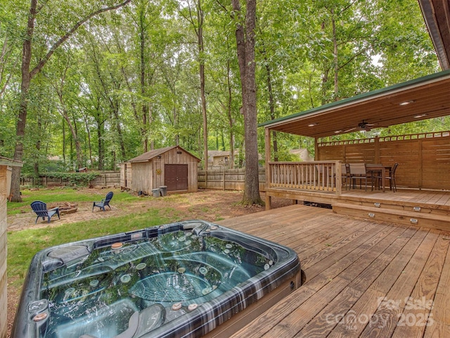 5109 Walnut Grove Ln, Charlotte, NC 28227 - deck with a fenced backyard, an outdoor fire pit, a storage shed, and ceiling fan