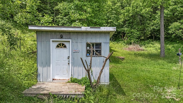311 Flynn Br, Madison, NC 28753 - view of outbuilding featuring a view of trees