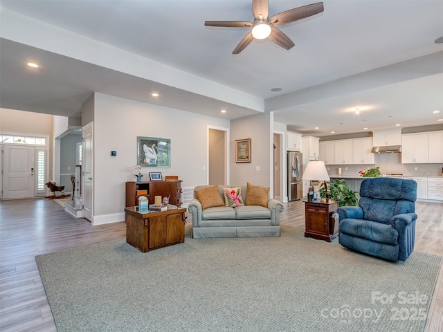 1011 Golden Bell Dr, Waxhaw, NC 28173 - living area featuring light wood-style floors, recessed lighting, and ceiling fan