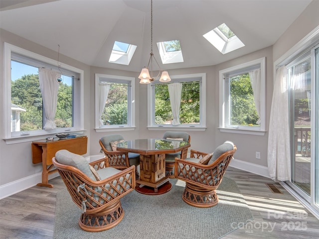 1011 Golden Bell Dr, Waxhaw, NC 28173 - sunroom featuring a skylight, plenty of natural light, and lofted ceiling