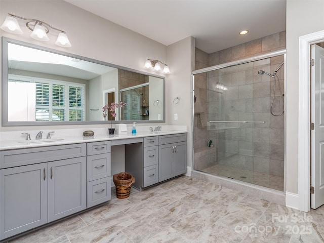 1011 Golden Bell Dr, Waxhaw, NC 28173 - bathroom featuring double vanity, a shower stall, and recessed lighting