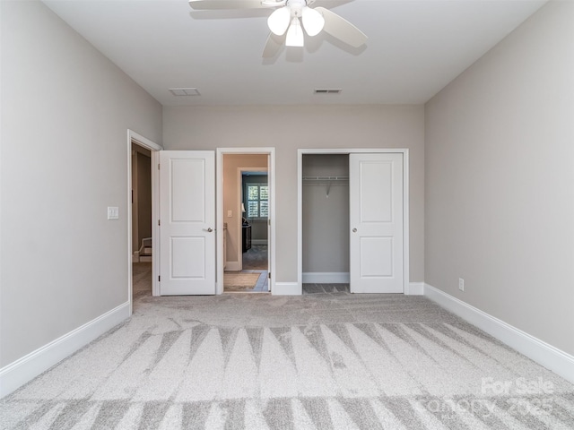 1011 Golden Bell Dr, Waxhaw, NC 28173 - unfurnished bedroom featuring carpet flooring, a closet, and ceiling fan