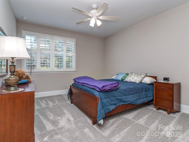1011 Golden Bell Dr, Waxhaw, NC 28173 - carpeted bedroom featuring baseboards and ceiling fan