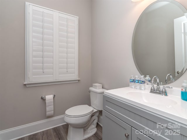 1011 Golden Bell Dr, Waxhaw, NC 28173 - half bath featuring vanity and wood finished floors