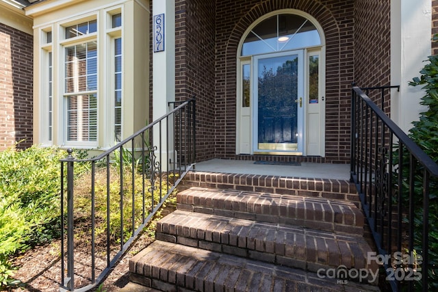 6507 Fairway Point Dr, Charlotte, NC 28269 - property entrance featuring brick siding and covered porch