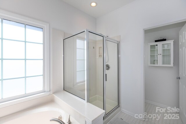 6507 Fairway Point Dr, Charlotte, NC 28269 - full bath with healthy amount of natural light, a stall shower, tile patterned flooring, and recessed lighting