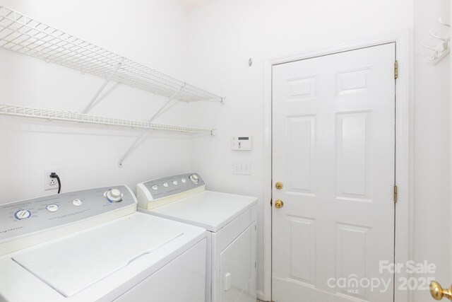 6507 Fairway Point Dr, Charlotte, NC 28269 - washroom featuring washing machine and clothes dryer