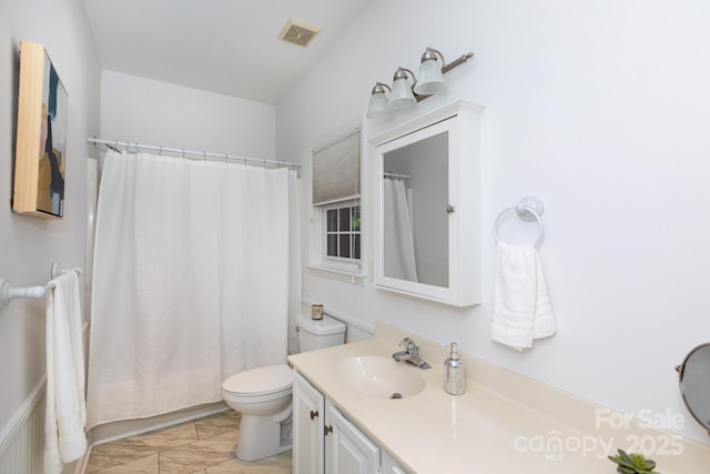 6507 Fairway Point Dr, Charlotte, NC 28269 - bathroom featuring marble finish flooring, vanity, and shower / bath combination with curtain