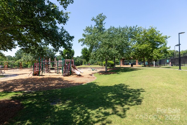 6507 Fairway Point Dr, Charlotte, NC 28269 - communal playground featuring a lawn