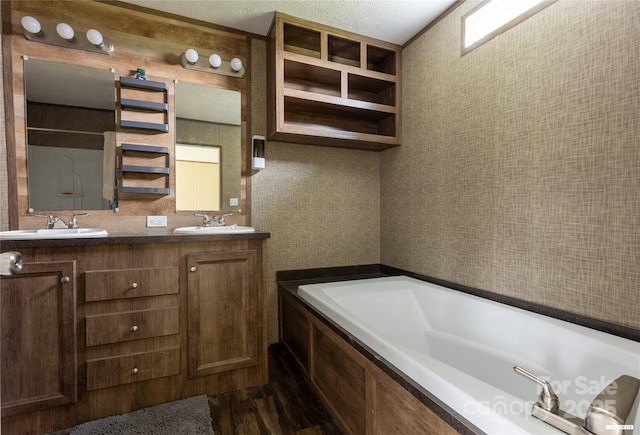 3655 Pinewood Rd, Sumter, SC 29154 - full bath with a bath, double vanity, and wood finished floors
