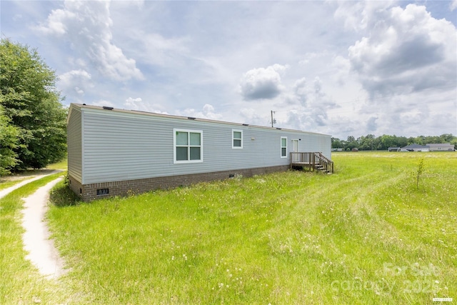 3655 Pinewood Rd, Sumter, SC 29154 - rear view of house with crawl space