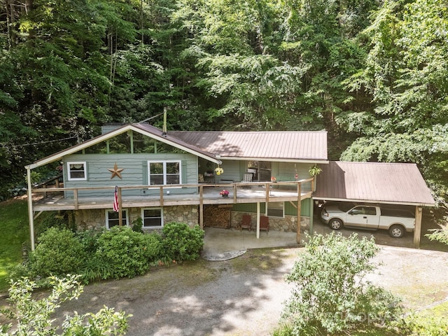 13884 Cruso Rd, Canton, NC 28716 - rustic home featuring stone siding, driveway, and a metal roof