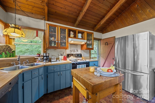 13884 Cruso Rd, Canton, NC 28716 - kitchen with freestanding refrigerator, dishwasher, blue cabinetry, wooden ceiling, and brick patterned floors