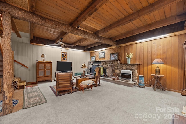 13884 Cruso Rd, Canton, NC 28716 - office space featuring carpet flooring, ceiling fan, wood walls, a wooden ceiling with exposed beams, and a stone fireplace