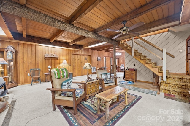 13884 Cruso Rd, Canton, NC 28716 - carpeted living area featuring wood walls, a wood ceiling with exposed beams, stairway, and a ceiling fan