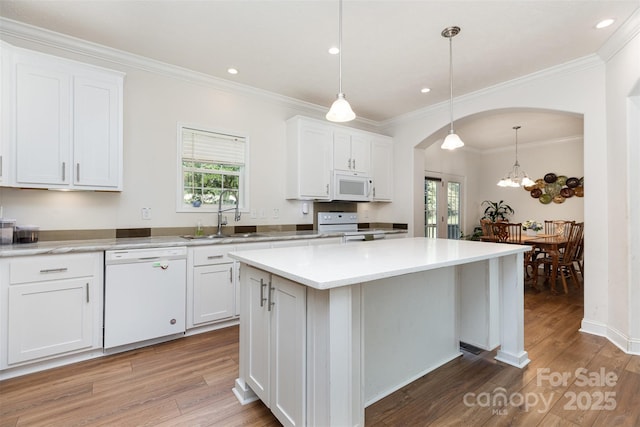 1593 Bloomfield Rd, Rock Hill, SC 29732 - kitchen featuring white appliances, healthy amount of natural light, crown molding, light wood-style floors, and recessed lighting