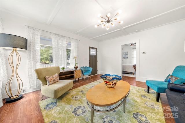 124 Marion St, Clover, SC 29710 - living room with a chandelier, wood finished floors, and beam ceiling