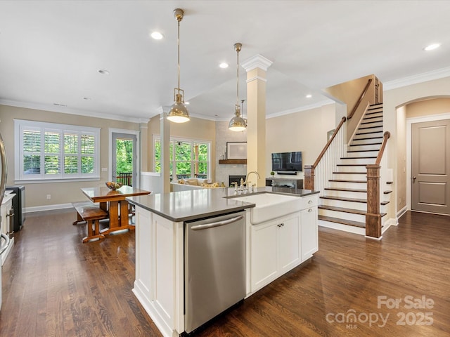 612 Ideal Way, Charlotte, NC 28203 - kitchen with stainless steel dishwasher, plenty of natural light, dark wood-type flooring, white cabinets, and crown molding