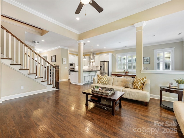 612 Ideal Way, Charlotte, NC 28203 - living area with decorative columns, ceiling fan, recessed lighting, dark wood-style flooring, and ornamental molding