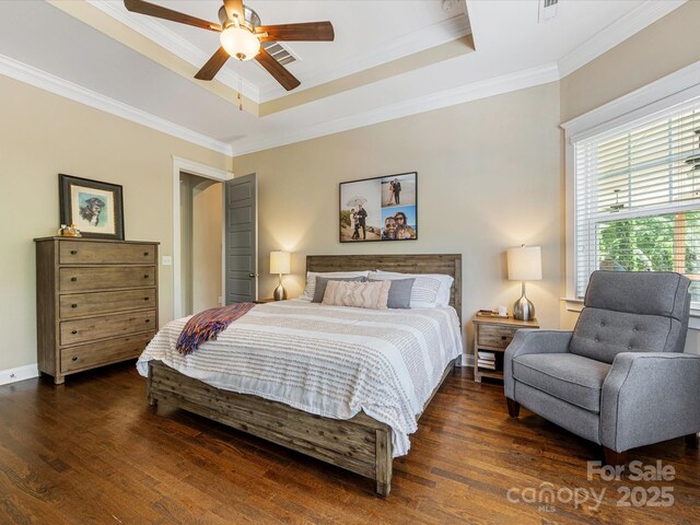 612 Ideal Way, Charlotte, NC 28203 - bedroom with a tray ceiling, ornamental molding, wood finished floors, and ceiling fan
