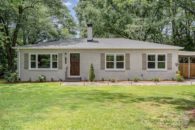 1006 Home Trl, Gastonia, NC 28052 - view of front of home with a chimney, brick siding, entry steps, and an attached carport