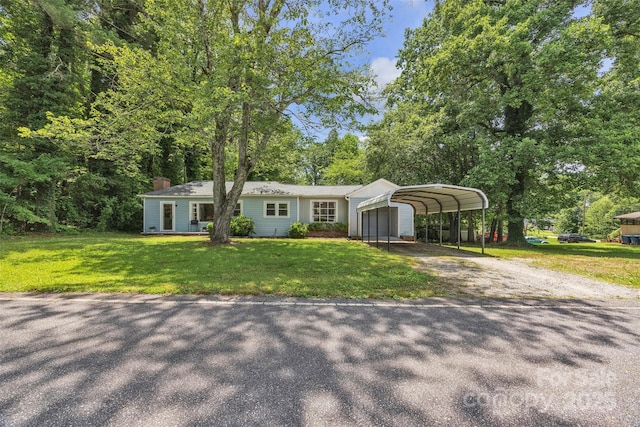 2222 19th Ave NE, Hickory, NC 28601 - view of front facade with driveway, a detached carport, a front lawn, and a chimney