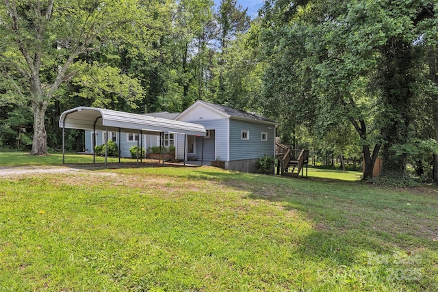 2222 19th Ave NE, Hickory, NC 28601 - view of front facade with a detached carport, a front yard, and dirt driveway