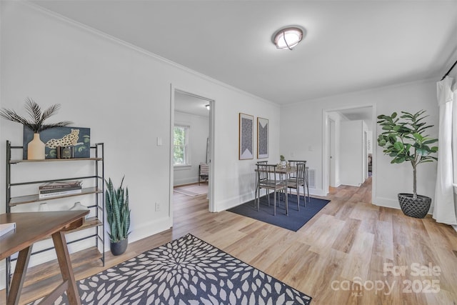 2222 19th Ave NE, Hickory, NC 28601 - dining room with light wood finished floors and ornamental molding