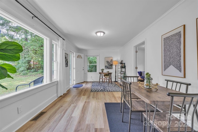 2222 19th Ave NE, Hickory, NC 28601 - dining room featuring light wood-style flooring and ornamental molding