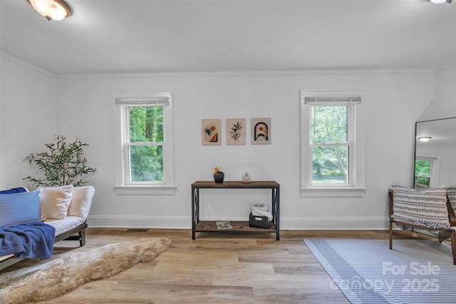 2222 19th Ave NE, Hickory, NC 28601 - living area featuring plenty of natural light, ornamental molding, and wood finished floors