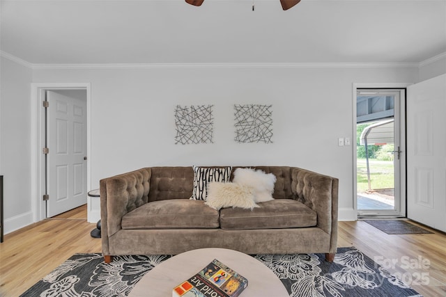 2222 19th Ave NE, Hickory, NC 28601 - living room with crown molding, wood finished floors, and a ceiling fan