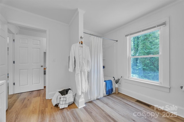 2222 19th Ave NE, Hickory, NC 28601 - full bath with crown molding, a shower with shower curtain, wood finished floors, and vanity
