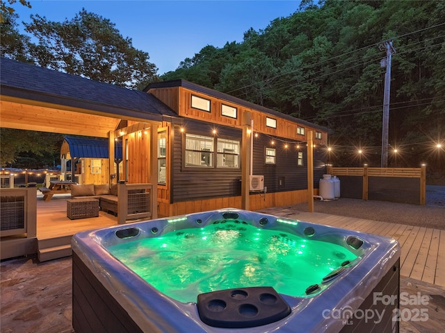 14715 Cruso Rd, Canton, NC 28716 - wooden terrace with an outdoor hot tub