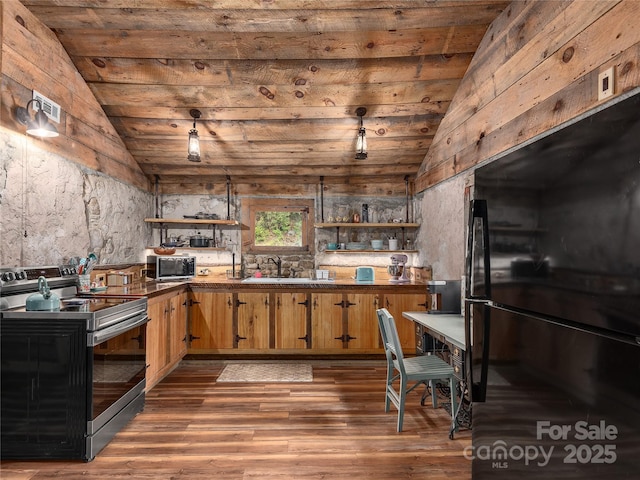 14715 Cruso Rd, Canton, NC 28716 - kitchen featuring freestanding refrigerator, stainless steel electric stove, open shelves, lofted ceiling, and wood finished floors