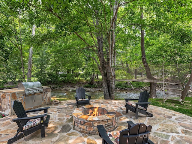 14715 Cruso Rd, Canton, NC 28716 - view of patio featuring a fire pit and area for grilling